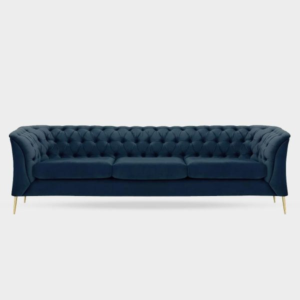A compact blue 3 seater Chesterfield sofa with tufted backrest and gold-colored legs.