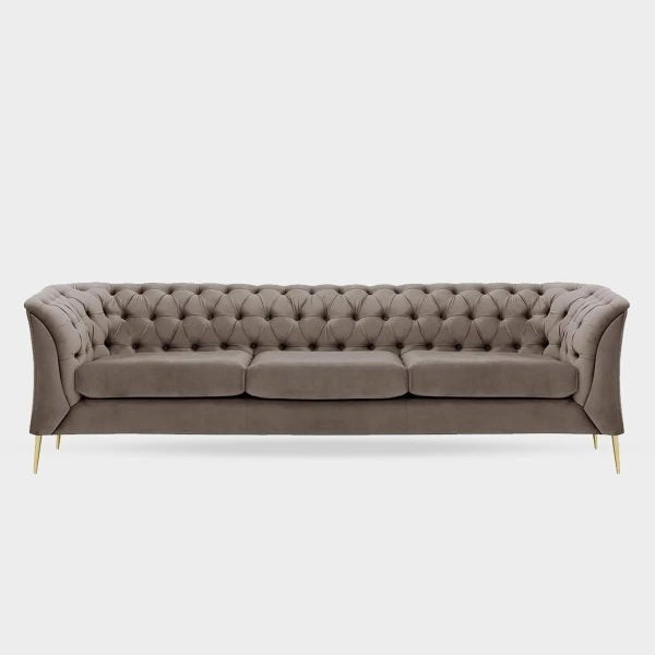 A compact blue 3 seater Chesterfield sofa with tufted backrest and gold-colored legs.