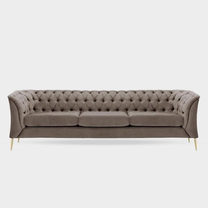 A compact blue 3 seater Chesterfield sofa with tufted backrest and gold-colored legs.